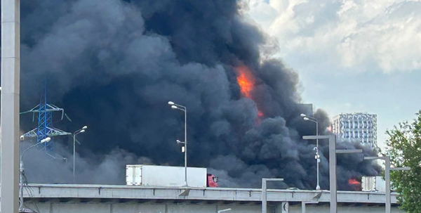 Fire erupts at Moscow construction site near highway, forcing road ...